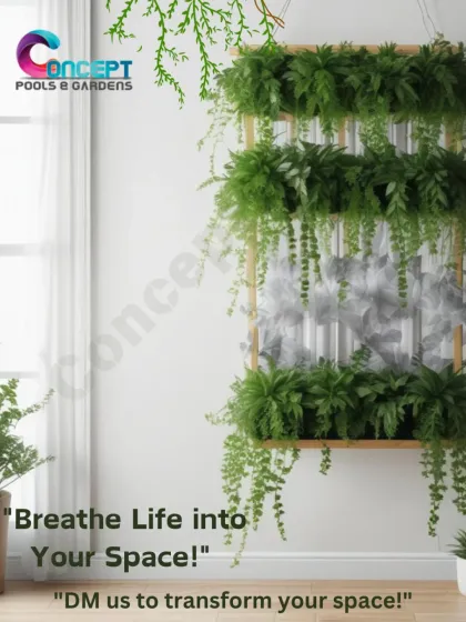 A framed vertical garden concept for an interior space. This design features hanging ferns and dense greenery within a simple wooden frame, demonstrating how to add a touch of nature to a plain wall.