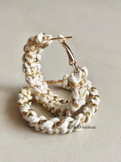 For a little bit of sparkle, I created these macrame hoop earrings. This pair is woven with a beautiful white cotton thread and a shiny golden zari thread. They are lightweight and perfect for when you want to dress up a little.