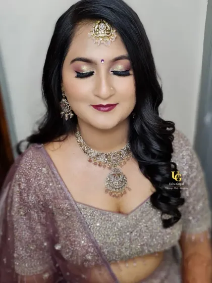 The elegant reception look for my beautiful Iyengar bride, Aishwarya. I created a soft glam eye with a hint of shimmer and paired it with voluminous waves for a modern yet timeless style.