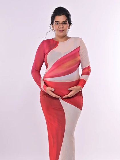 A modern and stylish maternity look. For this studio shoot, I created a clean, fresh makeup look to complement the bold, artistic dress.
