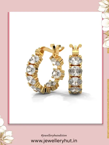 These oval-shaped hoops with sparkling stones are a modern take on a classic design, perfect for elevating any outfit.
