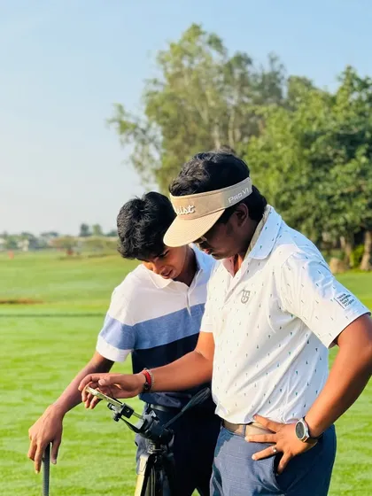 Our coaches are constantly on the range, providing hands-on instruction. From demonstrating a swing path to analyzing a student's setup, these moments of direct mentorship are where real progress is made.
