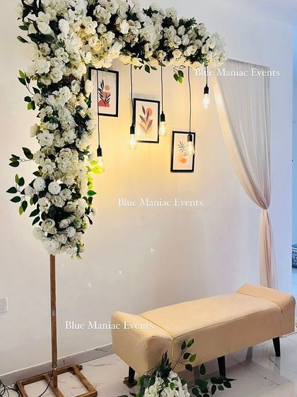 A side angle of the modern L-shaped floral stand, highlighting its structure and how the flowers and lights are arranged for a stylish, artistic effect.