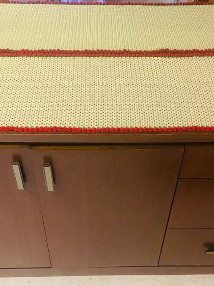 Another view of the custom side table runner, showing how it perfectly covers the surface of the cabinet.