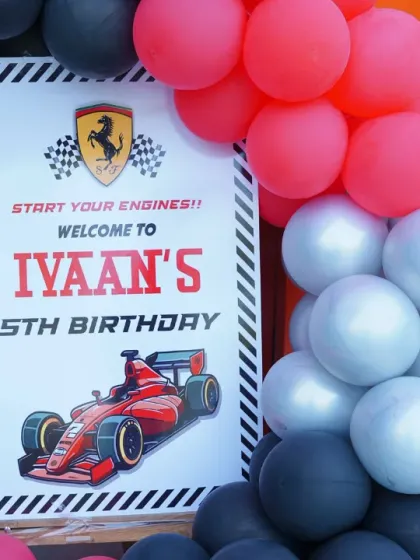 "Start your engines!" A Ferrari-themed welcome sign for Ivaan's 5th birthday. The iconic logo and race car graphic are perfect for a little Formula 1 fan.