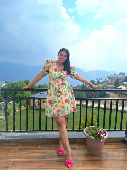 This floral print dress with puff sleeves is a great choice for a vacation or a summer day out. It's fun, feminine, and comfortable.