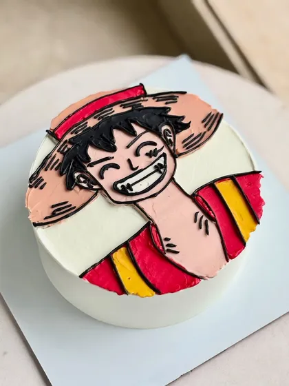 The Straw Hat pirate found his way onto this cake with his signature grin. I love bringing anime characters to life with detailed buttercream illustrations. Just share your reference and I’ll craft it into something delicious. ⚓