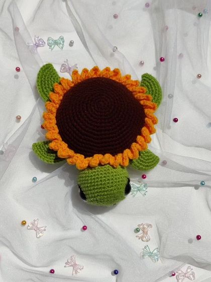 My unique sunflower turtle plushie, a hybrid of two of my favorite things.