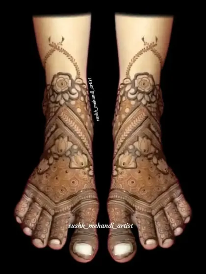 A delicate and graceful foot design with floral and vine patterns climbing up the ankle. This style is both modern and elegant.
