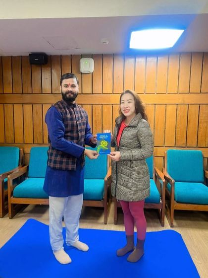 Welcoming a student from Mongolia to our yoga family with a gift of knowledge.