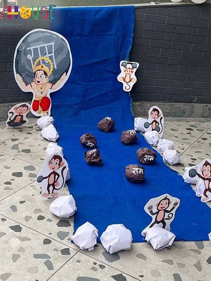 A creative setup for the Ramayan-themed party, depicting the building of the Ram Setu with monkeys and stones.