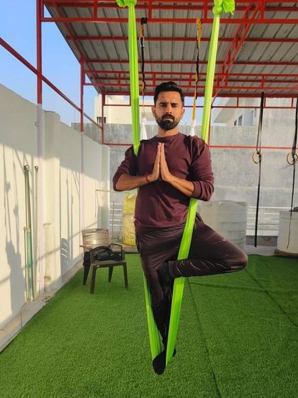 Another student holding a steady Tree Pose. It's amazing to see progress and focus.