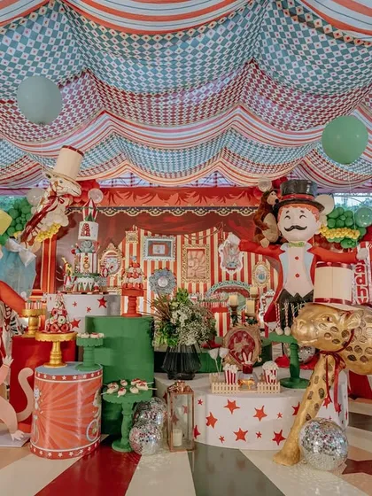 Welcome to the grandest show on earth. This wide view of the 'Cirque Royale' birthday party showcases the scale of my themed events, with dozens of custom-built props, a vibrant color palette, and a fully realized circus world designed to spark wonder and joy.