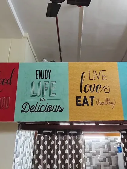 This typography-based wallpaper is great for cafes and restaurants. The colorful panels with positive food-related quotes help create a lively and welcoming dining atmosphere.