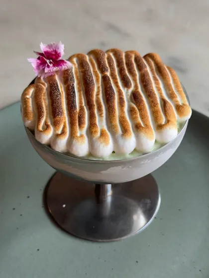 The Plats Baked Alaska, with beautifully torched meringue peaks. A dramatic and delicious end to brunch.