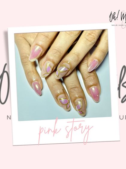 Because basic nails don't make statements. This pink set features a mix of chrome finishes and abstract gold line work for a modern and stylish look.