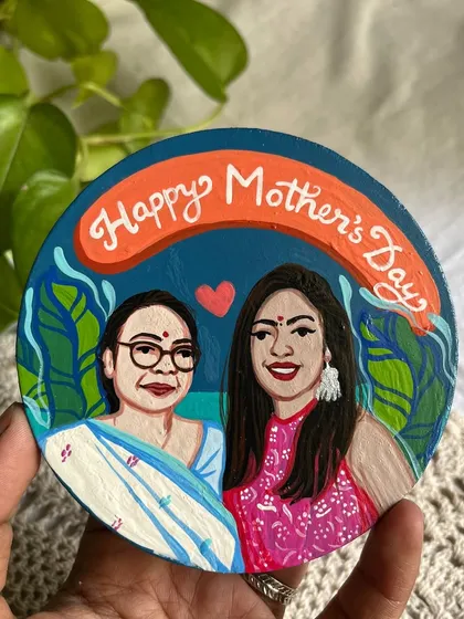 A 'Happy Mother's Day' coaster featuring a portrait of a mother and daughter.