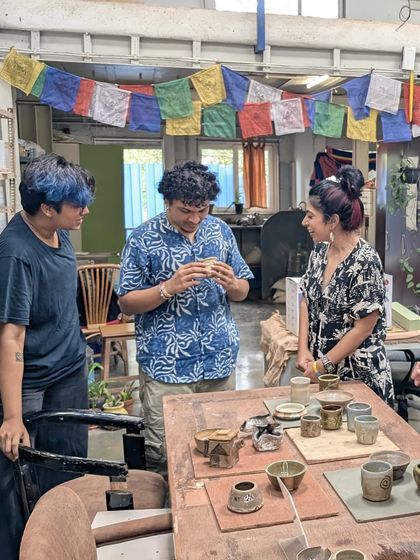 Here, students are discussing their pieces during an Open Studio day. These informal chats are where so much learning happens, as we share tips, ideas, and encouragement.