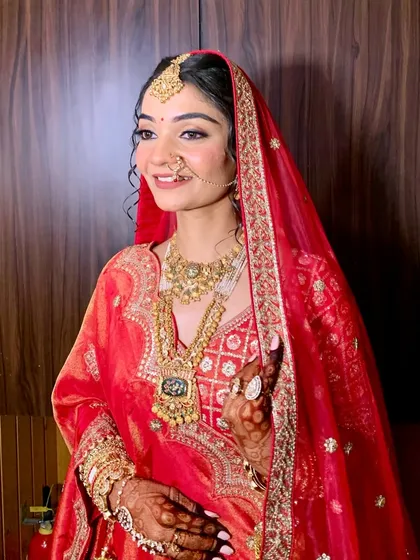 Another angle of this beautiful bride, showcasing her radiant smile. My goal is always to make sure the makeup enhances, not masks, the bride's happiness.