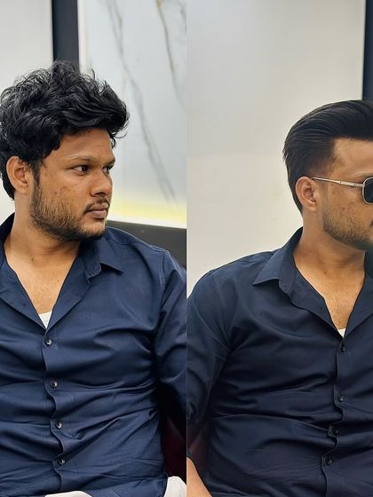 From an overgrown style to a sharp, polished look. This men's haircut transformation includes a clean fade and precise styling, topped off with sunglasses for extra attitude.