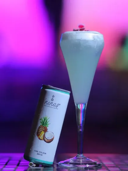 A cool blue piña colada inspired drink we created for a new menu launch. It's a refreshing, tropical escape in a glass.