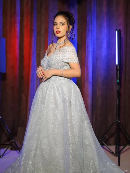 A complete engagement look photoshoot featuring our silver off-shoulder ball gown. The series of five images provides a comprehensive look at the final result.