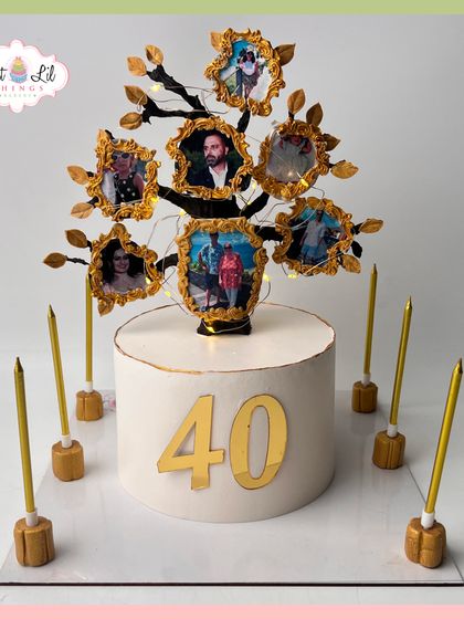 A unique and personal 40th birthday cake featuring a "family tree" topper with framed photos of loved ones.