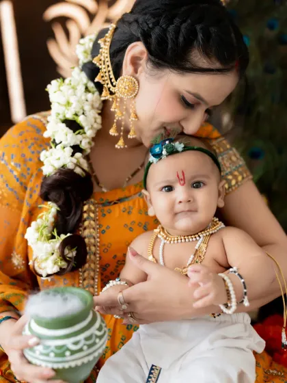 Celebrating your little Kanha's arrival. This Janmashtami-themed newborn shoot is a beautiful way to honor our traditions, showing a mother's endless love for her child.