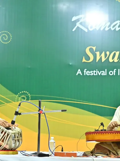 Pictures from the Komal Nishad concert, providing tabla accompaniment for Pandit Debashish Bhattacharya ji on the slide guitar.