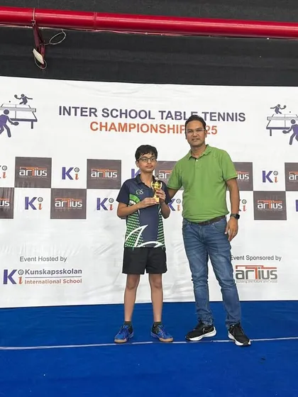 Laksh Malik receiving his 3rd place trophy in the Under 14 Boys category at the same Inter-School Table Tennis Championship. It's great to see our players succeed across different age groups.