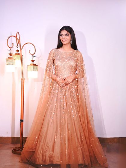 A full-length portrait that captures the complete, elegant look.