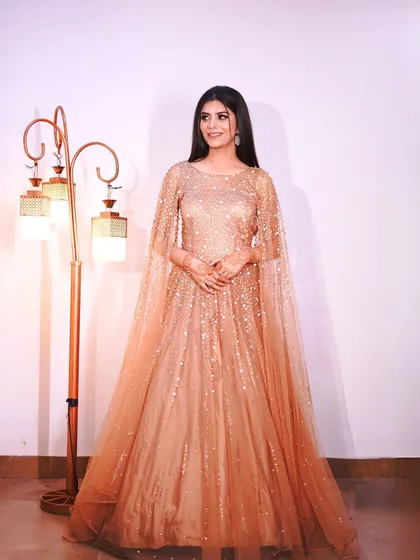A full-length portrait that captures the complete, elegant look.