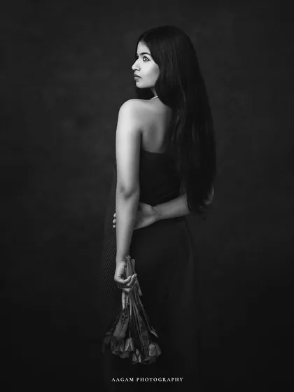 The poetry of presence, captured in classic black and white. The monochrome treatment adds a layer of mystery and timelessness to this romantic portrait.