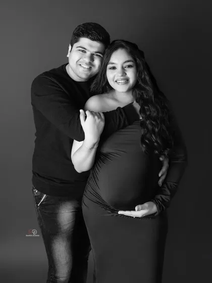 Here is the same portrait in black and white. It creates a different mood, emphasizing their expressions and the classic composition of the shot.