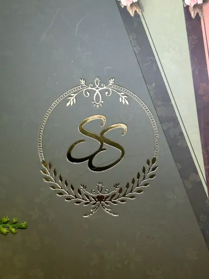 Your initials, beautifully intertwined. I specialize in creating custom monograms with elegant gold foiling that become the signature of your wedding, a personal brand for your new beginning together.