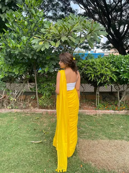 I chose to wear yellow for my graduation day. It is the color of knowledge, learning, and the Guru. It symbolizes the purity and light that I seek to embody as both a student and a teacher.