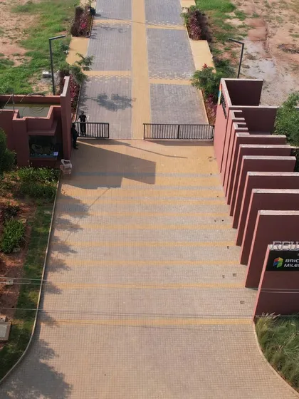The entrance to a new layout development in Bangalore sets the tone for the entire community. The design uses a series of architectural fins and carefully selected planting to create a strong sense of arrival.