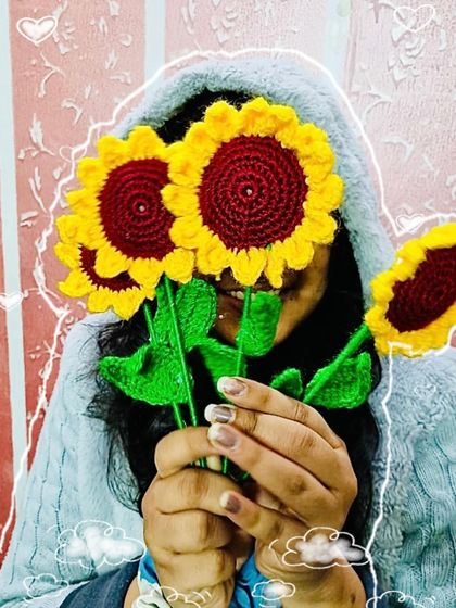 Another playful shot with my crochet sunflowers. I pour my heart into every piece, and I love seeing them bring joy.