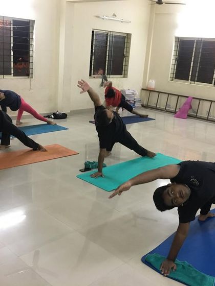 Another shot from our arm strengthening session, with students holding a variation of side plank.