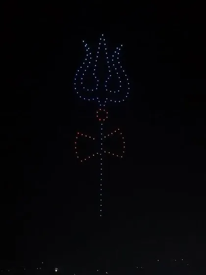 A Trishul formation against the night sky at the Chintpurni Festival. This symbol of Lord Shiva's power was a highlight of our spiritual drone show.