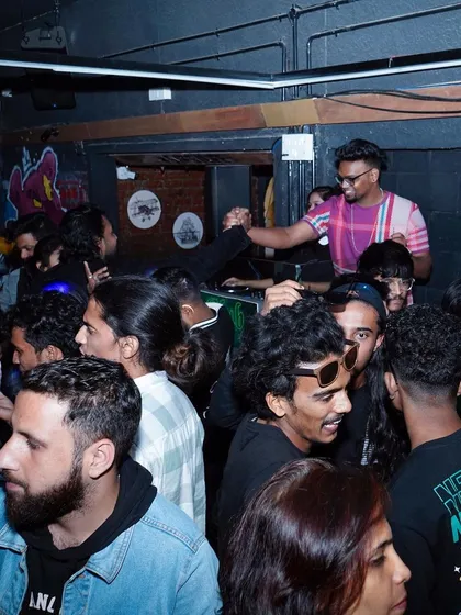A packed house is the best compliment. This shot captures the close-knit, high-energy vibe I love to create, making everyone feel like part of the party.