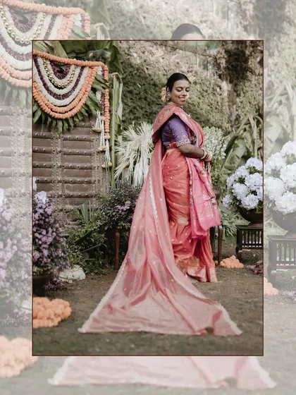 The elegance of a Maharashtrian bride in her traditional nauwari saree. This full-length portrait captures the grace of her attire and the beautiful, natural setting, showcasing a blend of tradition and creative photography.