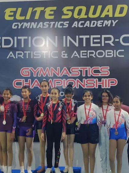 More moments of triumph from various competitions, showcasing our gymnasts with their medals, trophies, and proud coaches.