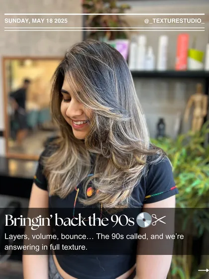 Bringin' back the 90s with this layered, voluminous cut. The 90s called, and we're answering in full texture.