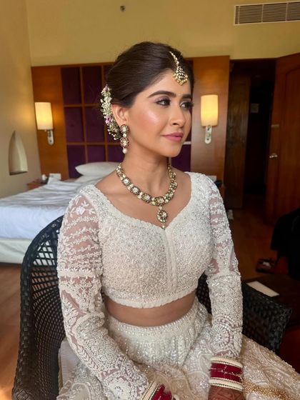 Timeless Bridal Buns & Updos photo 12