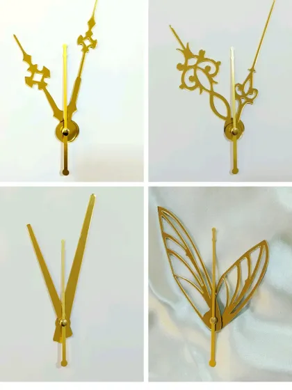 Our collection of golden clock hands includes several decorative styles. This image showcases four different designs, including a beautiful butterfly wing set, to perfectly complement your resin clock.