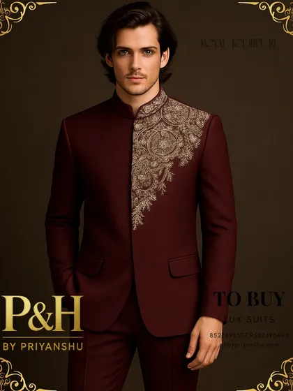 A close-up portrait of the wine maroon Jodhpuri, allowing a detailed look at the handcrafted golden embroidery.