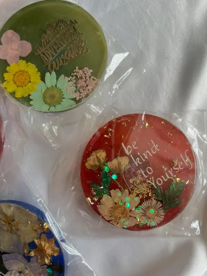 Tiny blooms and meaningful words. These handmade fridge magnets with real flowers and inspiring quotes are perfect for Rakhi. It's a unique gift that your siblings will actually use and love.