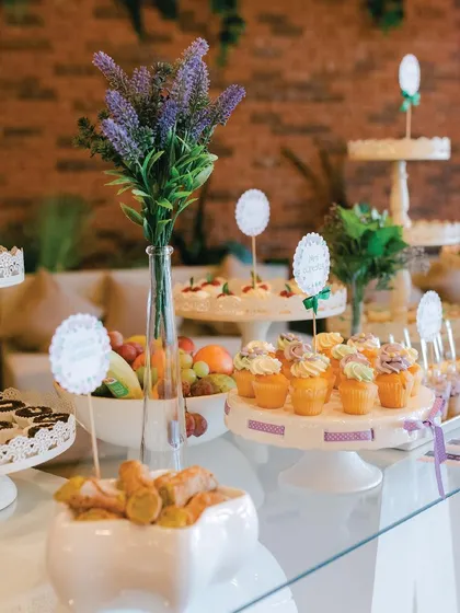 A beautiful dessert and snack table set up for a corporate event. The clean, elegant presentation is perfect for business gatherings, from conferences to celebratory dinners.