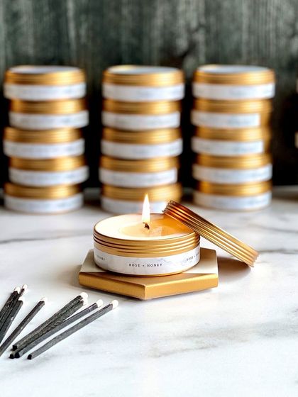 Stacks of our tin candles ready for a bulk order. They are easy to label, pack, and transport, making them ideal for large events.
